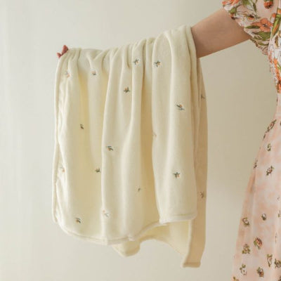 couverture bébé beige en velours avec olives