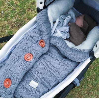 gigoteuse bébé en tricot bleu gris - nid d'ange