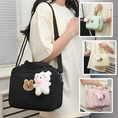 sac à langer noir avec ourson pendentif et variantes